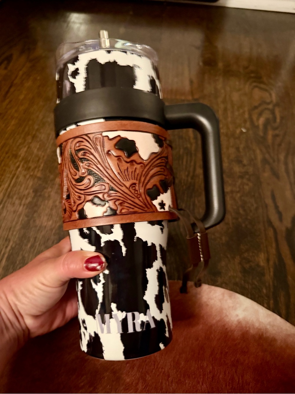 Myra Bag Black & White Cow Print Travel Tumbler with Brown Tooled Leather Sleeve
